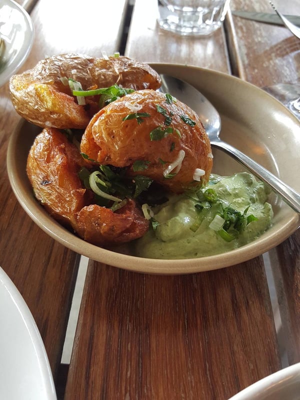 Smoked potatoes with green goddess dressing