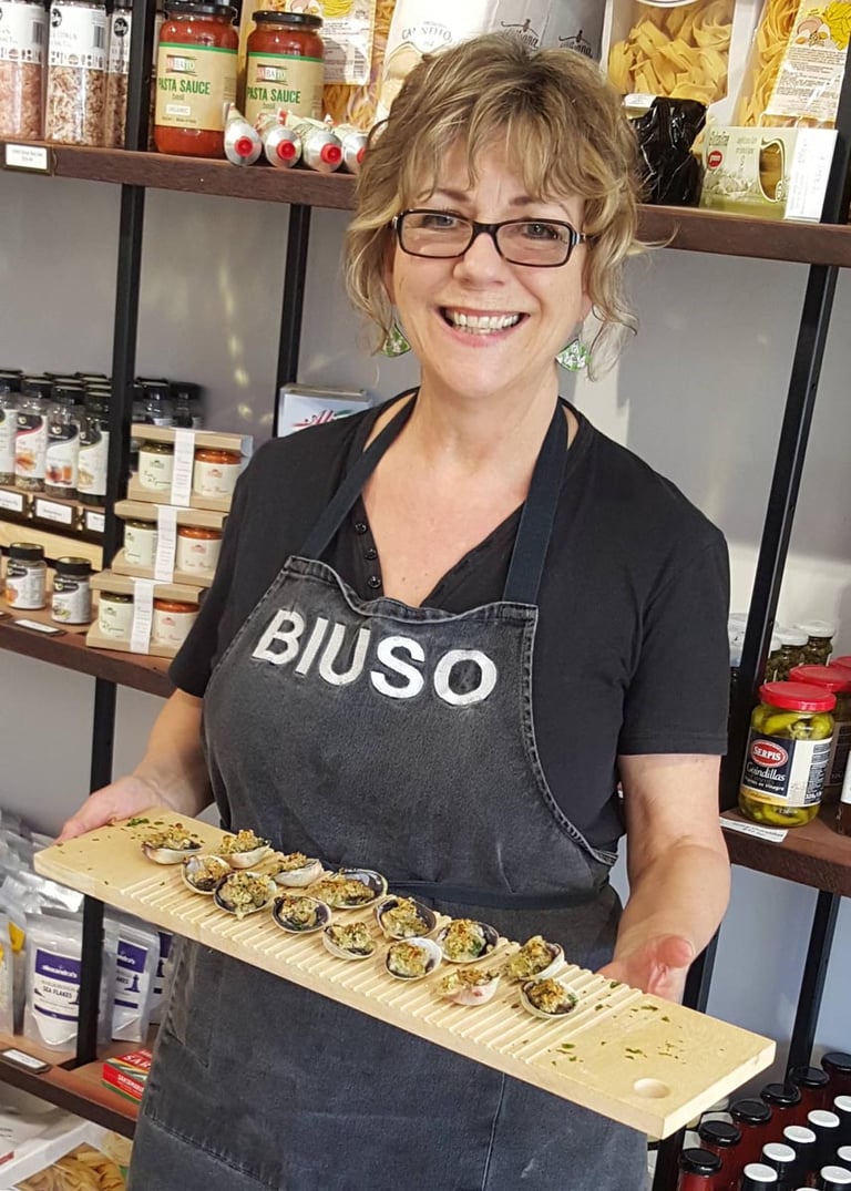 Julie at Te Matuku Oysters with baked clams