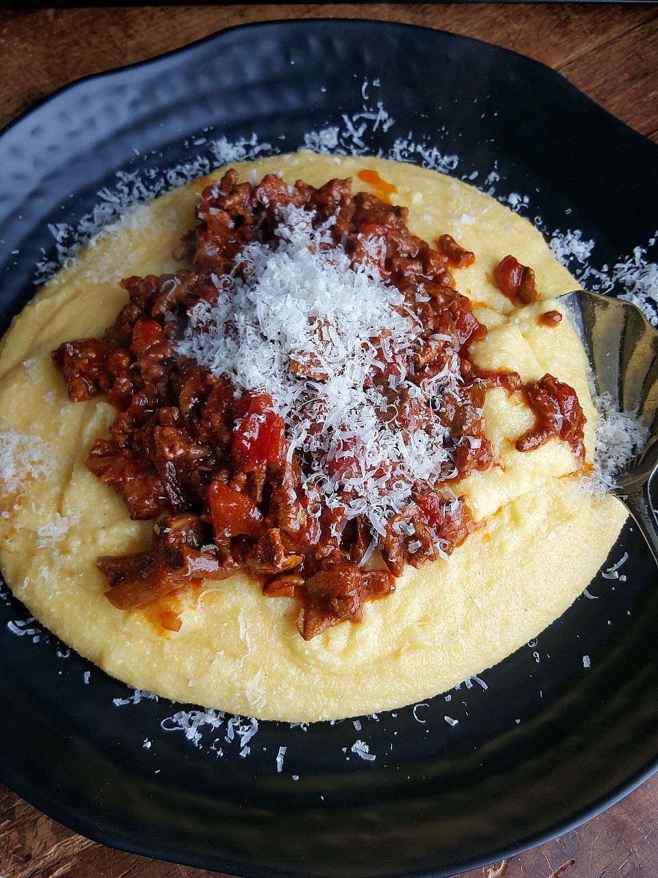 Cheesy polenta with Porcini Ragu