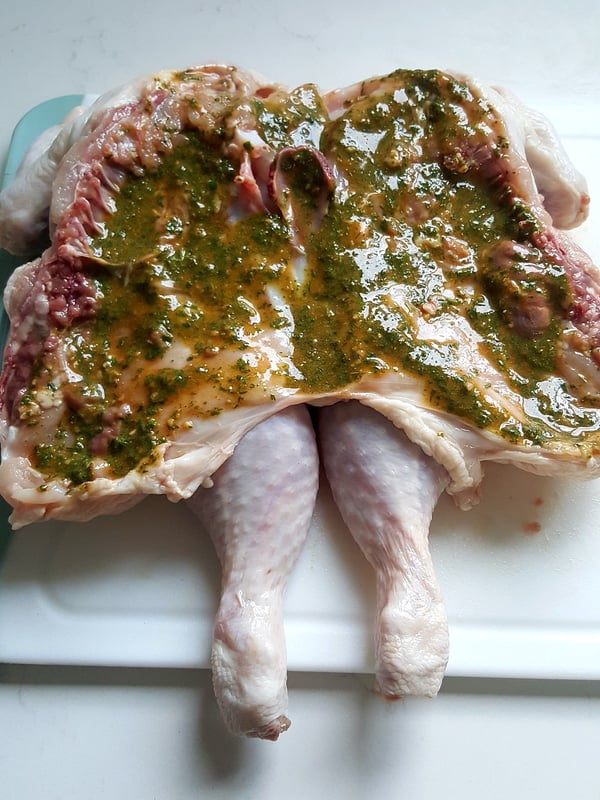 Spatchcocking a chicken.