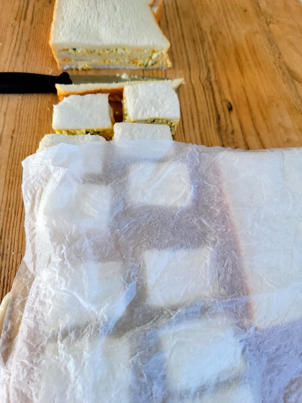 Stop sandwiches curling up with damp paper towels.