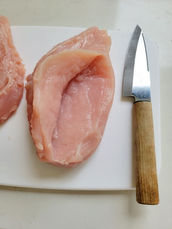 Making a pocket in a chicken breast.