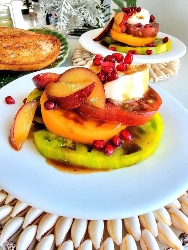Burrata & Tomato Salad with Nectarine Pomegranate Dressing