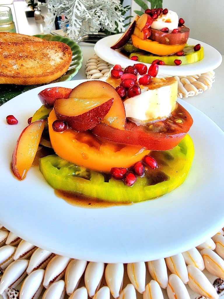Burrata & Tomato Salad with Nectarine Pomegranate Dressing