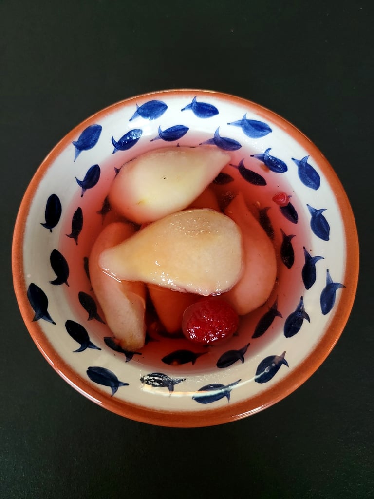 Honeyed Pears in Pink Syrup