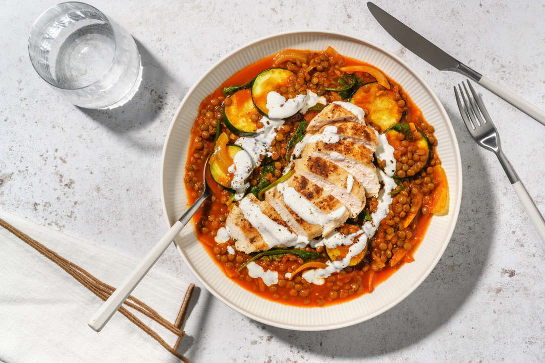 Chicken breast on spiced lentils with courgette