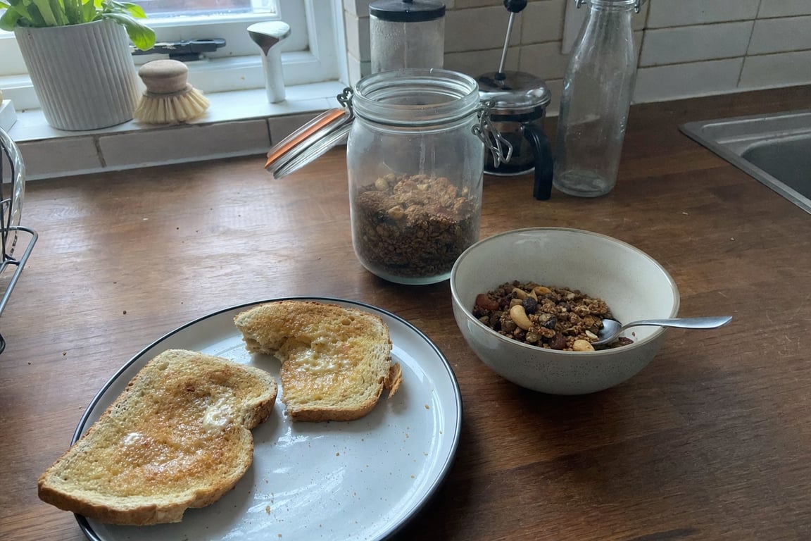 A typical healthy-looking breakfast of granola, toast with jam and orange juice that quietly spikes blood sugar