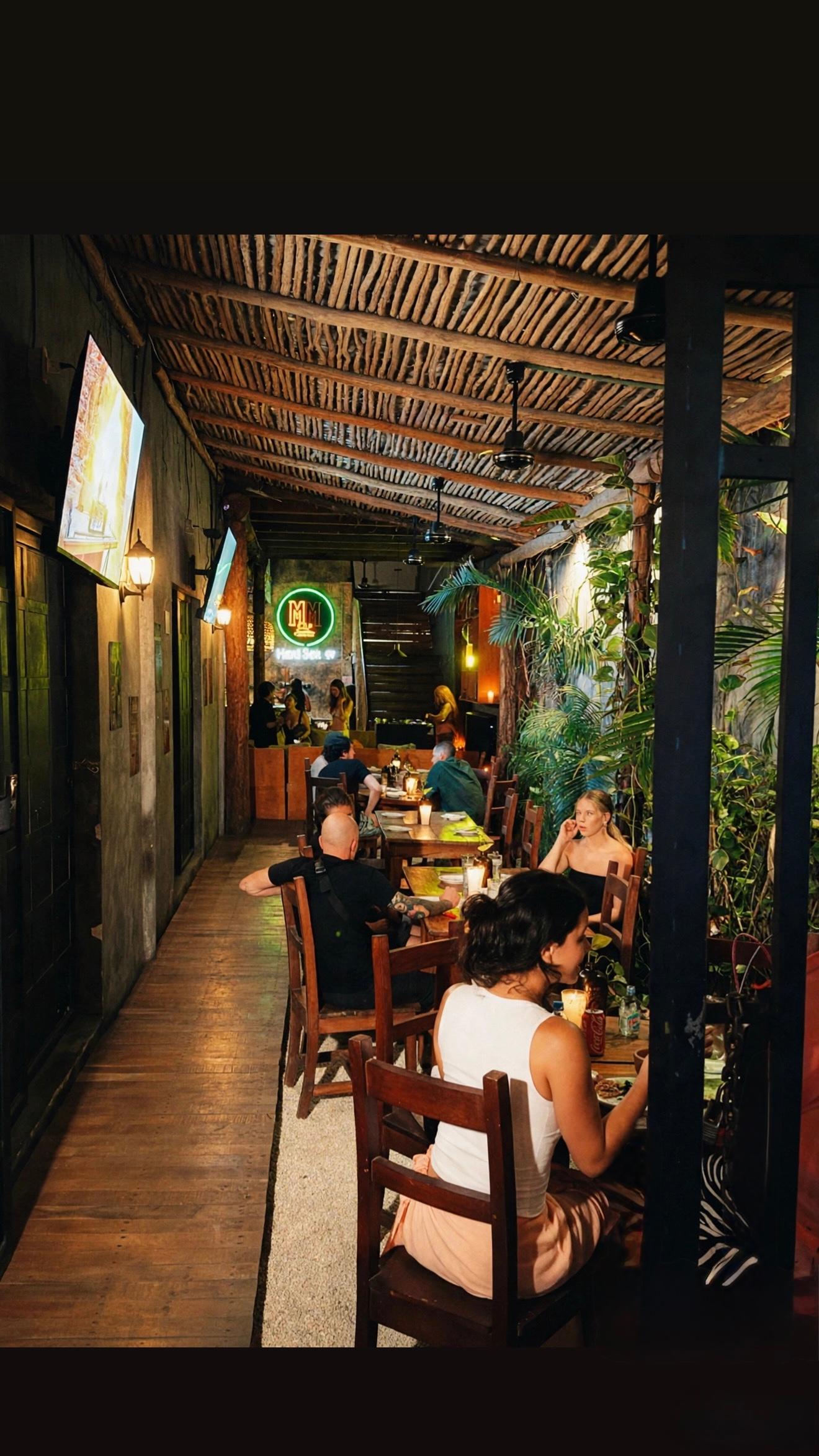 Patrons dine at candle