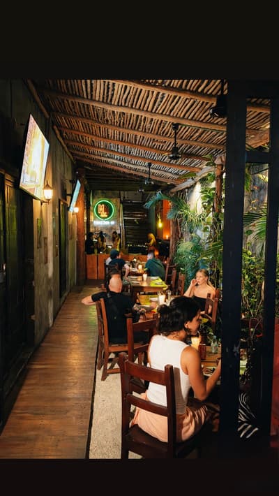 Patrons dine at candle