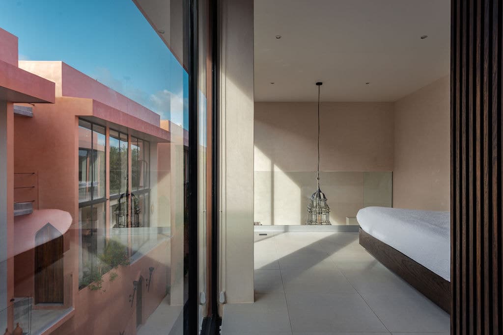 Bathroom opening onto the exterior walkway