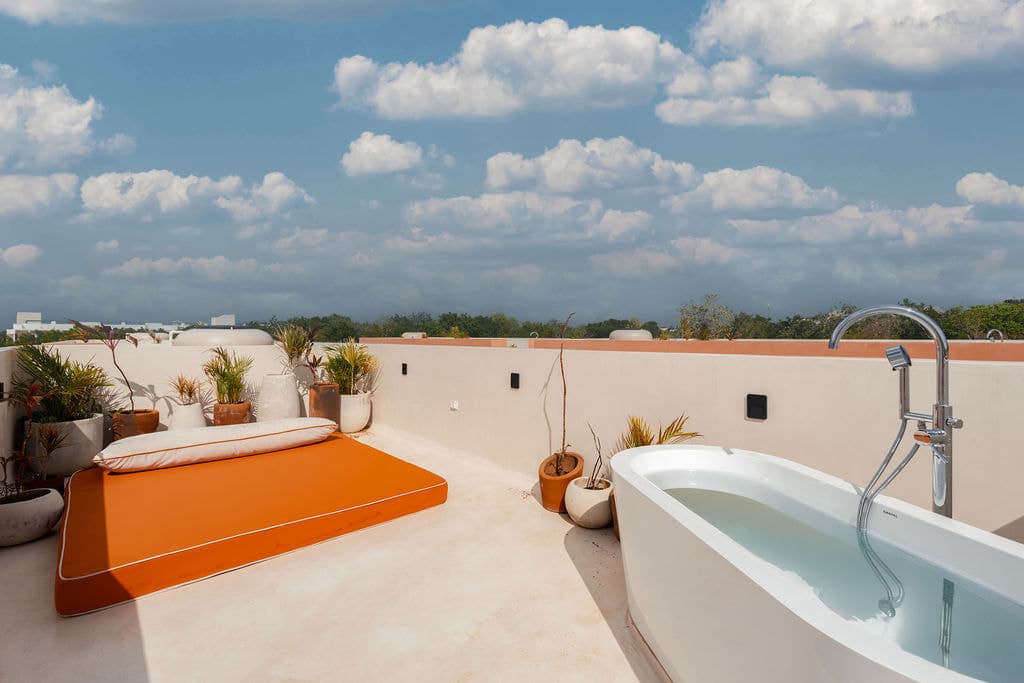 Freestanding bathtub on a private rooftop