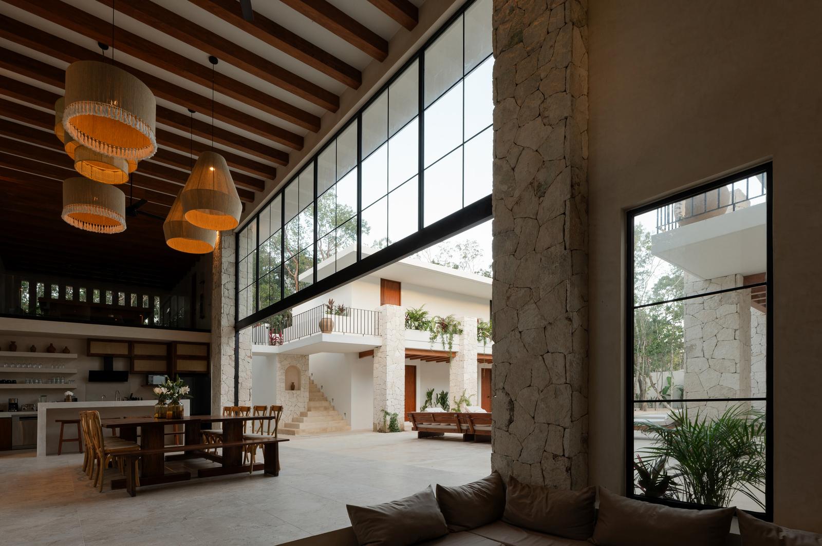 Dining under woven pendant lights