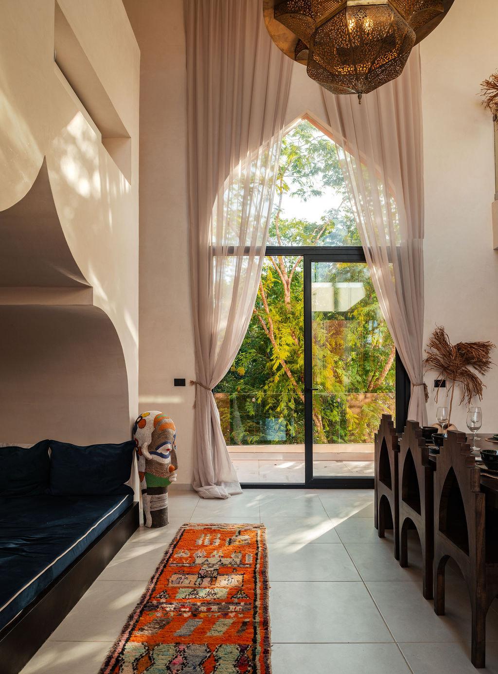 Bedroom window opening onto the treeline