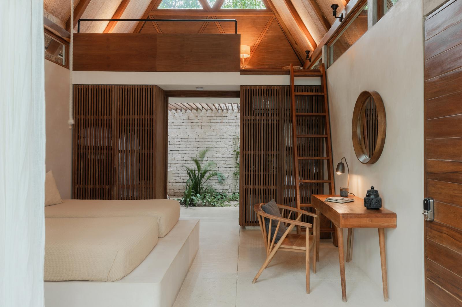 Daybed and ladder to the loft in one of the lodges