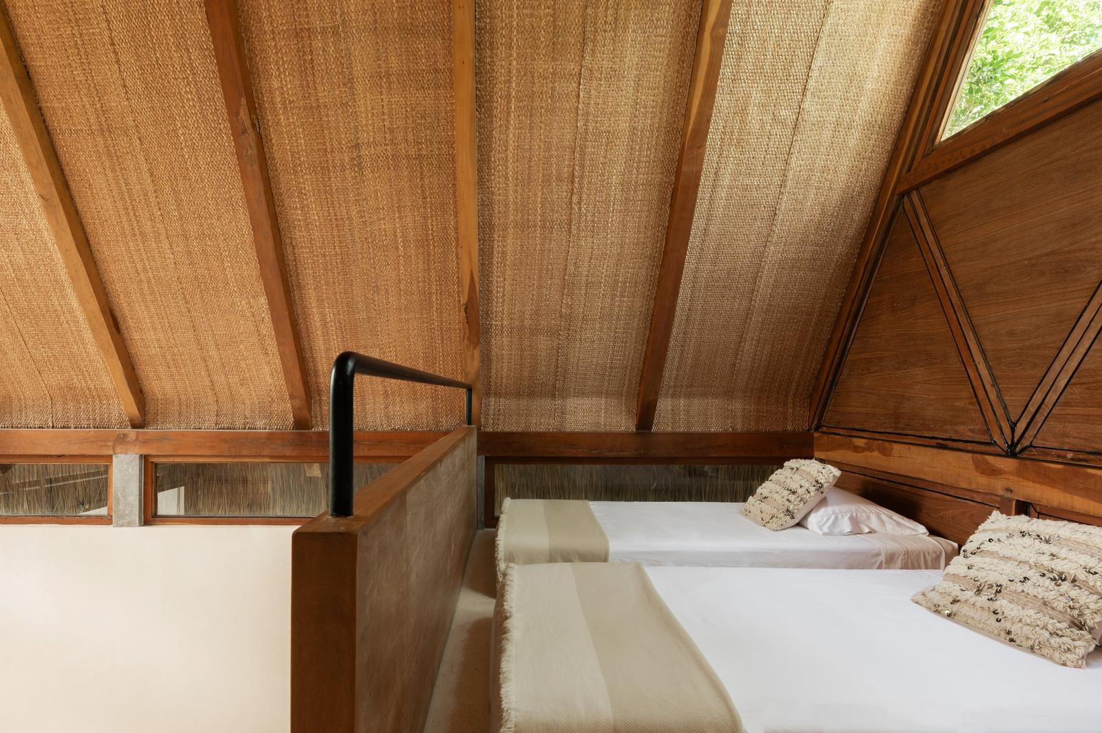 Twin beds on the mezzanine, under the palapa