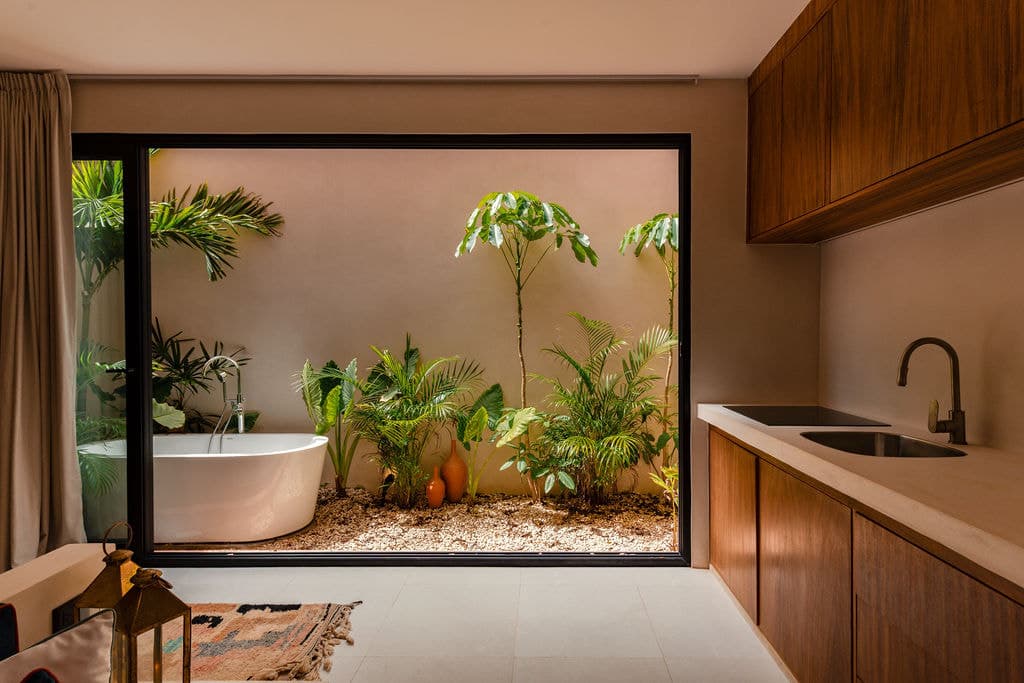 Garden bathtub beside a kitchenette