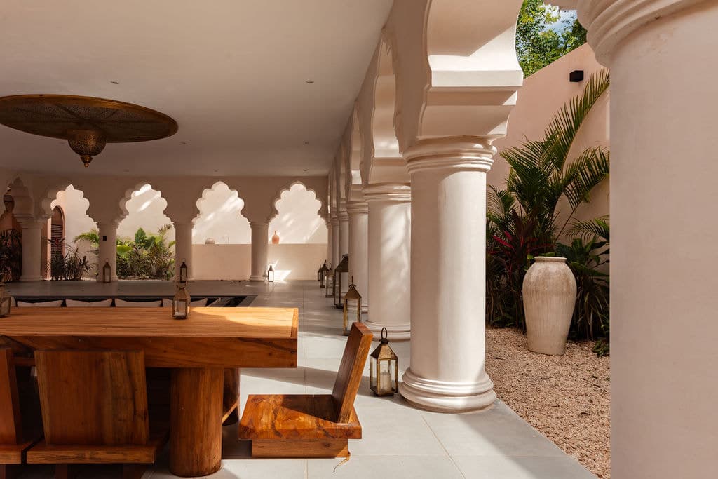 Colonnade dining area open to the garden