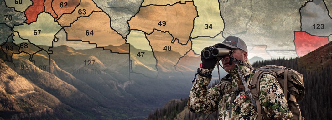 Guy Eastman in the Mountains over a map