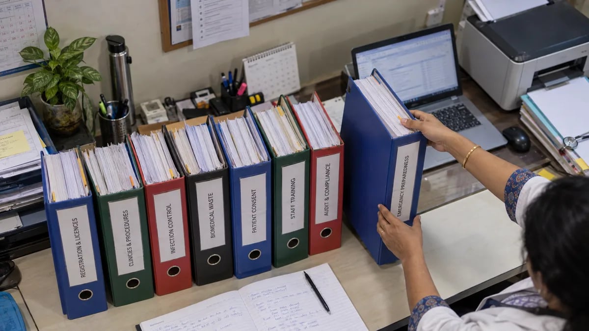Ring binders of clinic protocols and records prepared for an accreditation assessment