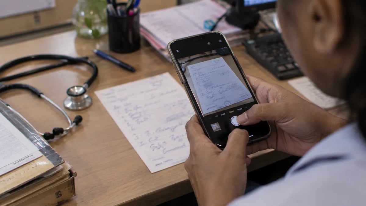 Photographing a printed prescription to send it on WhatsApp, the usual way records travel