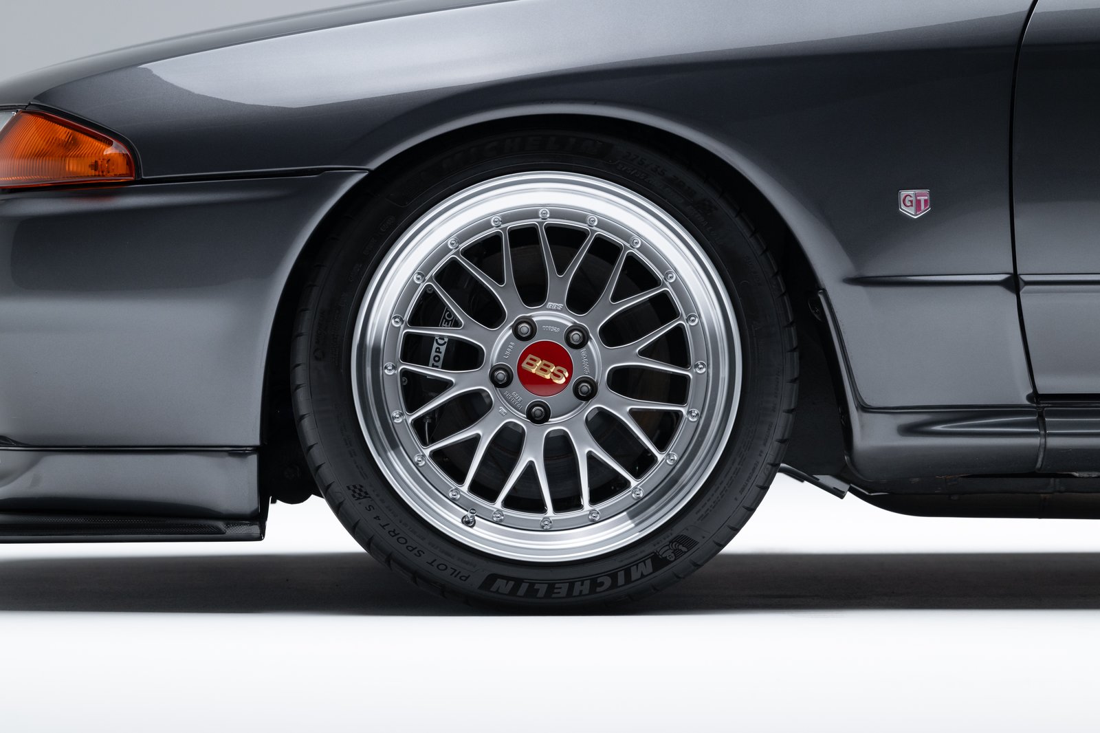 R32 GT-R side profile showing aggressive stance