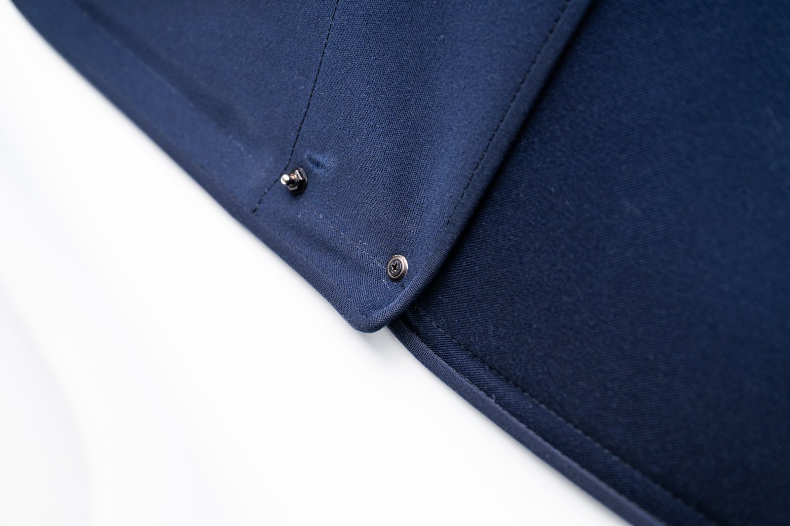 Dark blue soft-top detail on the Grand Prix White 1988 Porsche 911 Carrera Cabriolet.