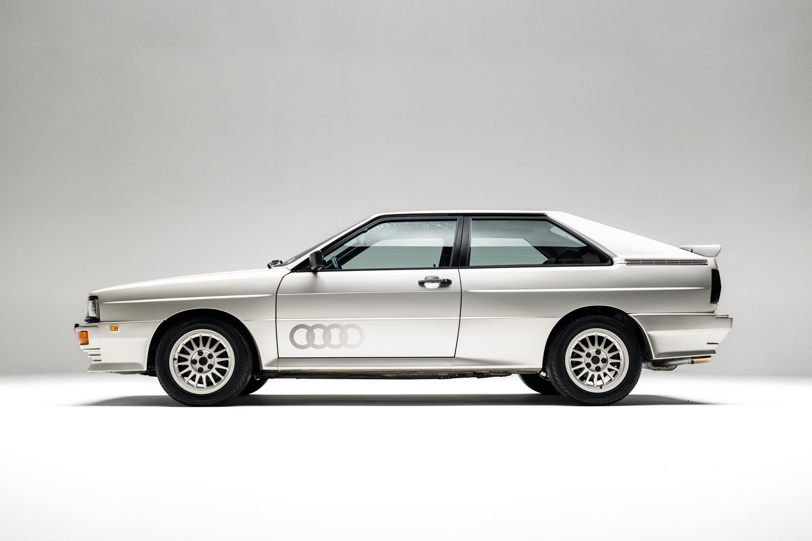 Full side profile of the Zermatt Silver 1986 Audi WR Ur-Quattro.
