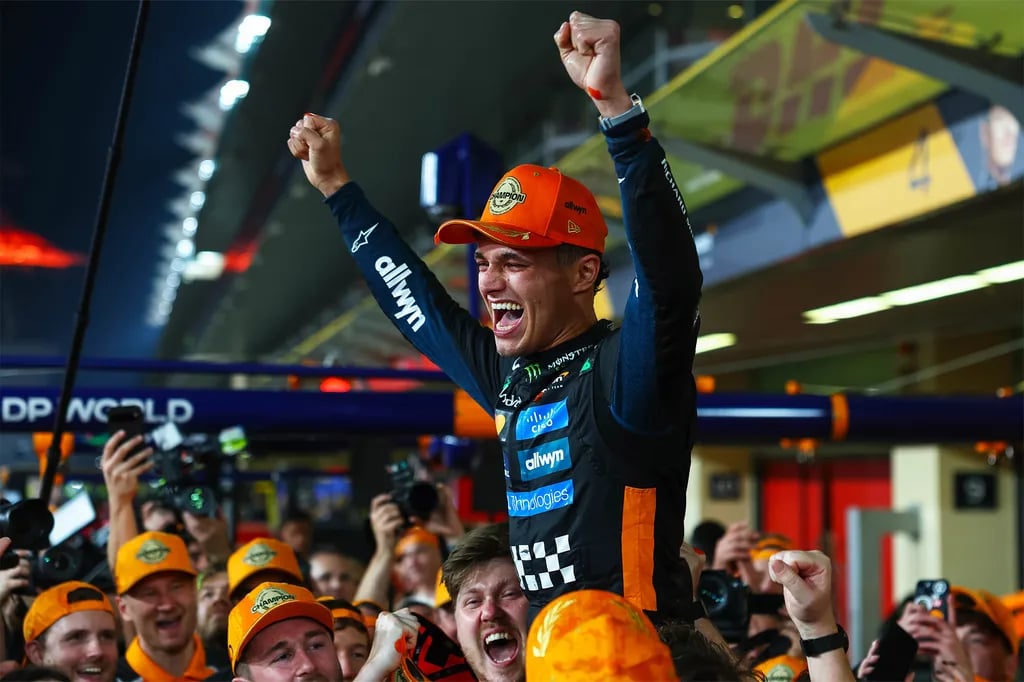 Lando Norris celebrates winning the 2025 World Drivers Championship