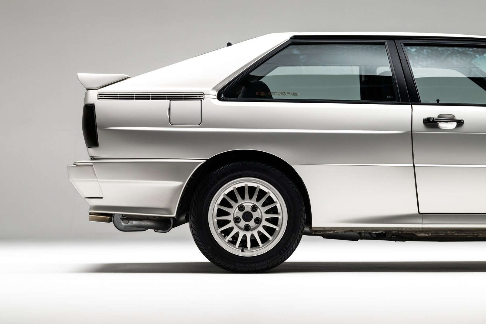 Rear-biased side-profile studio view of the 1986 Audi WR Ur-Quattro.