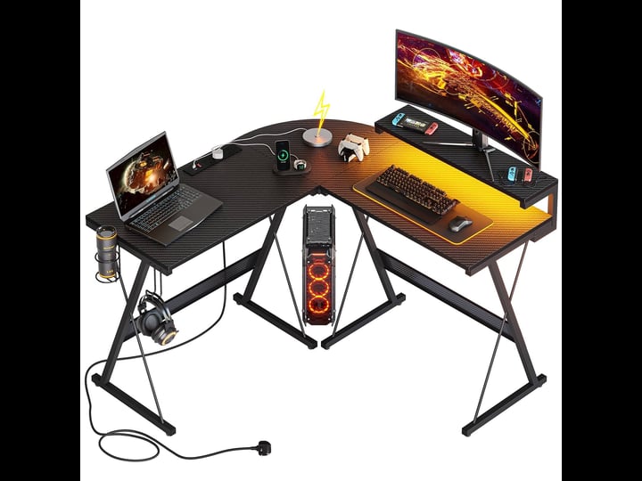bestier-51-34-in-black-carbon-fiber-gaming-l-shaped-computer-desk-with-monitor-stand-and-power-outle-1
