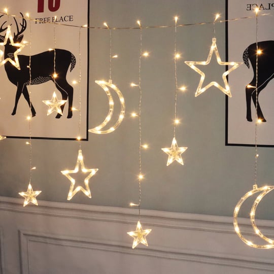 mainstays-144-count-indoor-battery-operated-warm-white-led-curtain-lights-with-stars-and-moons-1
