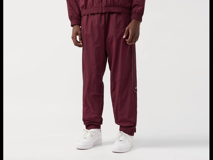 nike-nrg-premium-essentials-track-pants-red-1