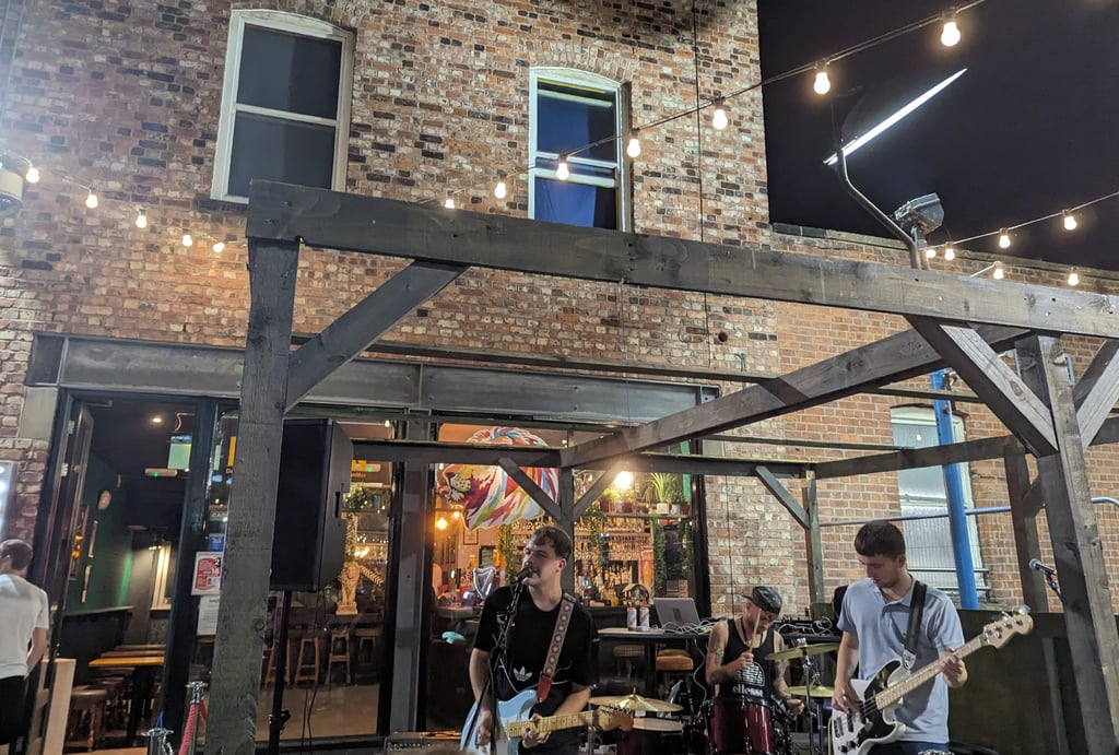 Jace Campbell playing at Lion's Den