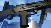 A bump stock attached to a semiautomatic rifle