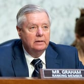 Lindsey Graham sits in a chair during a Senate Judiciary Committee hearing.