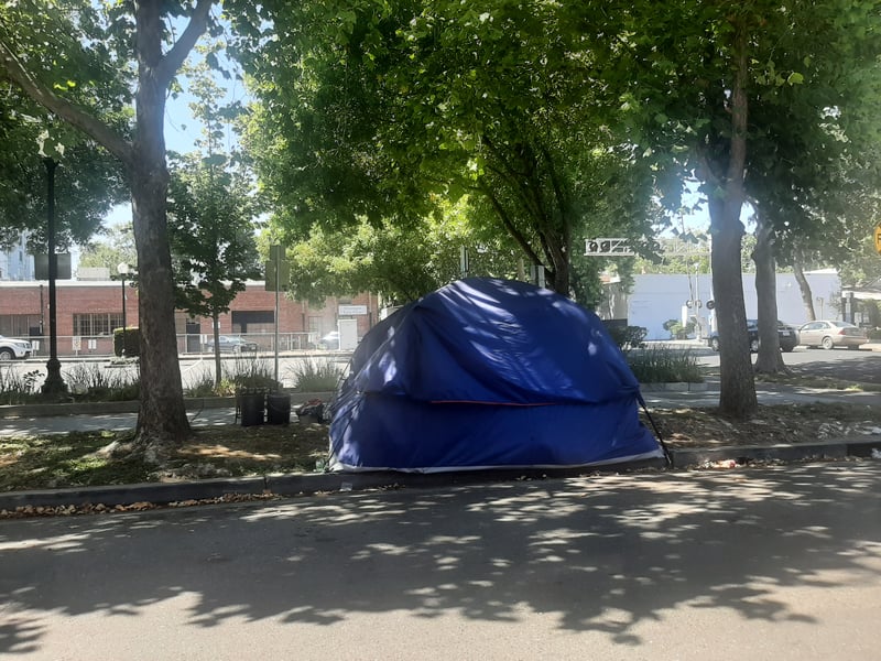 The tent of an unhoused person.
