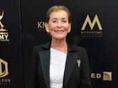 Judge Judy smiles while standing outside the 46th edition of the Daytime Emmy Awards.