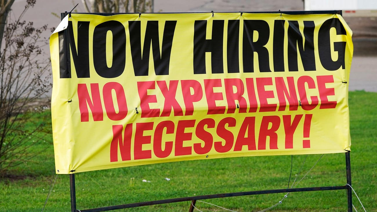 This is art director Helmut Krone and copywriter Julian Koenig on behalf of  Doyle Dane Bernbach, circa 1960. I couldn't find credits for this  particular ad, but I'll bet a substantial amount, image size:1300x731