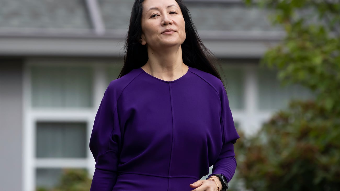 Meng Wanzhou, chief financial officer of Huawei, leaves home to attend what is expected to be the final day of her extradition hearing at B.C. Supreme Court, in Vancouver, on Wednesday, Aug. 18, 2021.  (Darryl Dyck/The Canadian Press via AP)