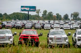 Chevrolet Silverados and GMC Sierra pickups built at Flint Assembly are packed.