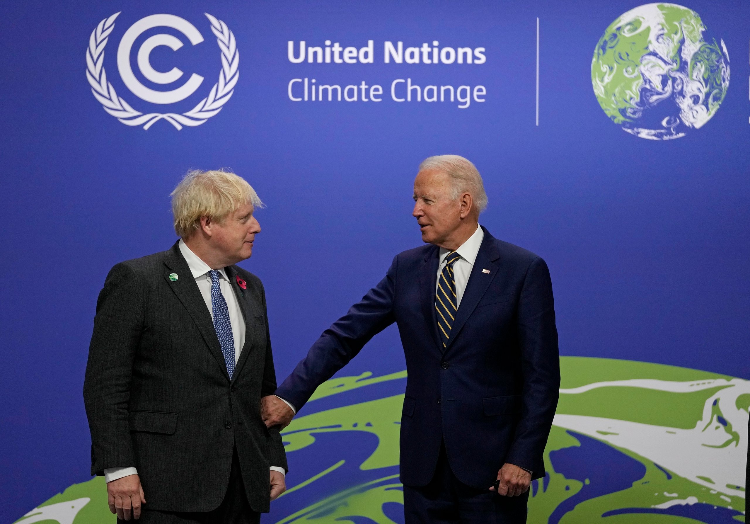 Biden apologizes for US pulling out of Paris accord under Trump ...