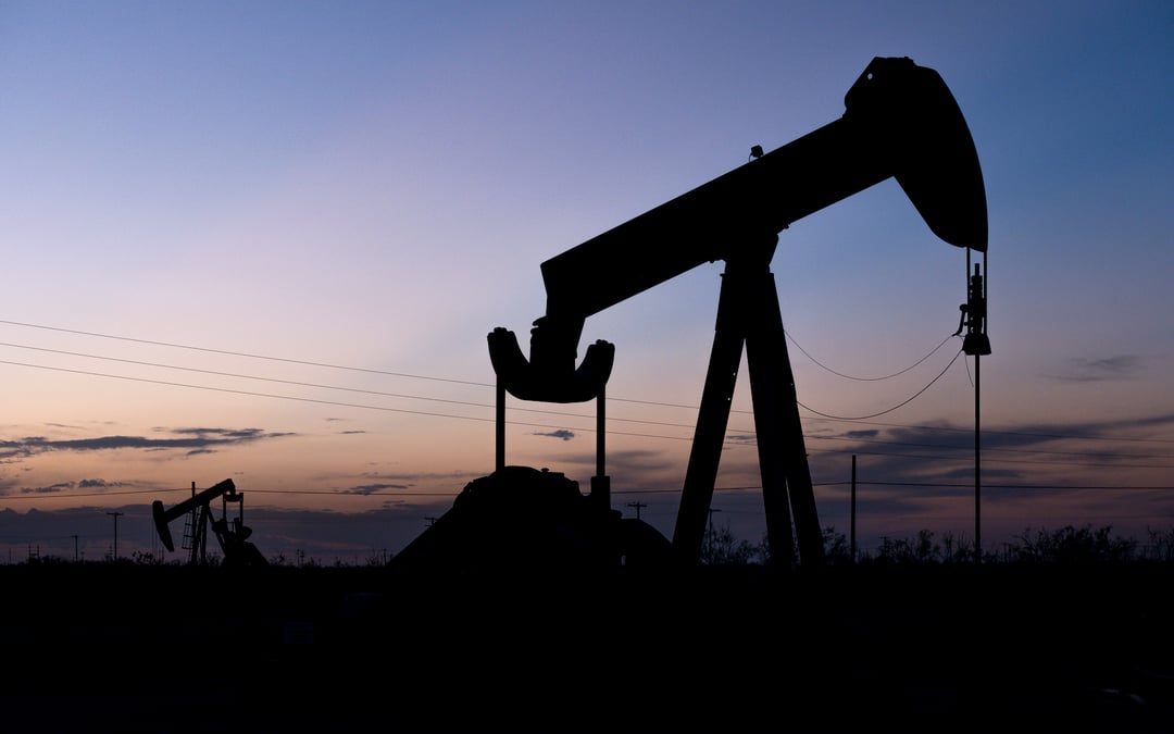 Oil companies to pay record fee for pre-merger gun-jumping