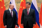 Vladimir Putin and Xi Jinping meet in Beijing, China.