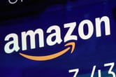 Amazon's logo is displayed on a screen at the Nasdaq MarketSite.
