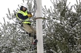 A worker runs fiber optic cable in Vermont.