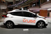 A Cruise autonomous vehicle in a showroom.