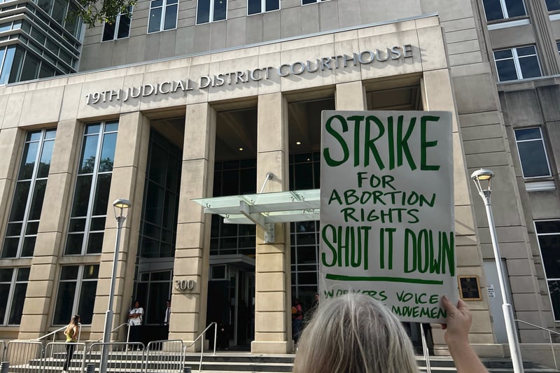 An abortion rights advocate demonstrates outside a courthouse in Louisiana.