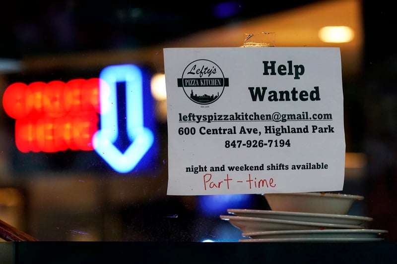 A now-hiring sign in Highland Park, Illinois
