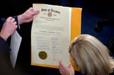 The certification of Arizona Electoral College votes is unsealed at the Capitol, Jan 6, 2021.