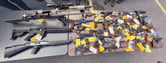 Some of the firearms that were surrendered to law enforcement at a gun buyback event.
